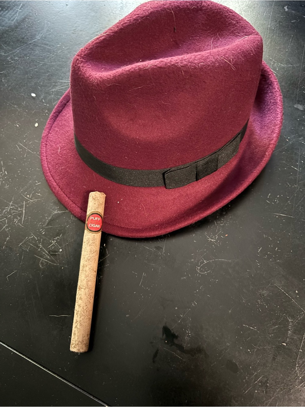 Burgundy Fedora with toy cigar